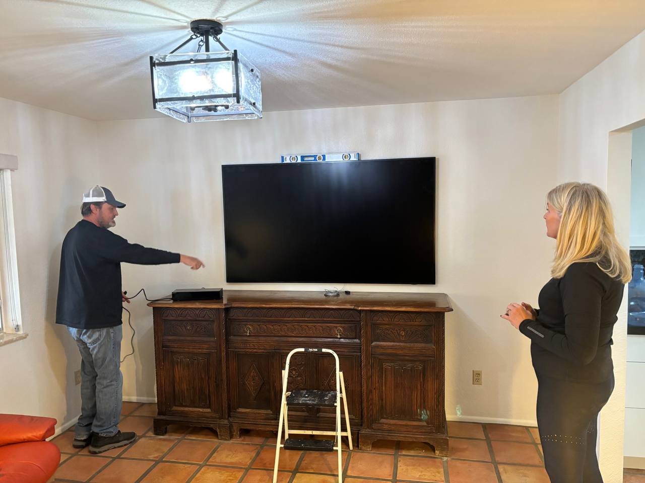 Drew planning a large TV mount with a Tucson homeowner