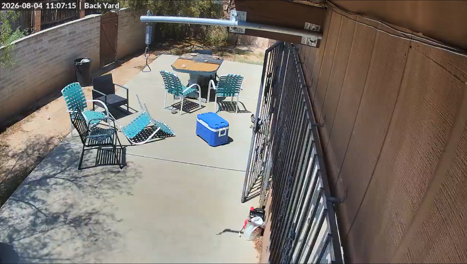 UniFi camera view of a Tucson back yard