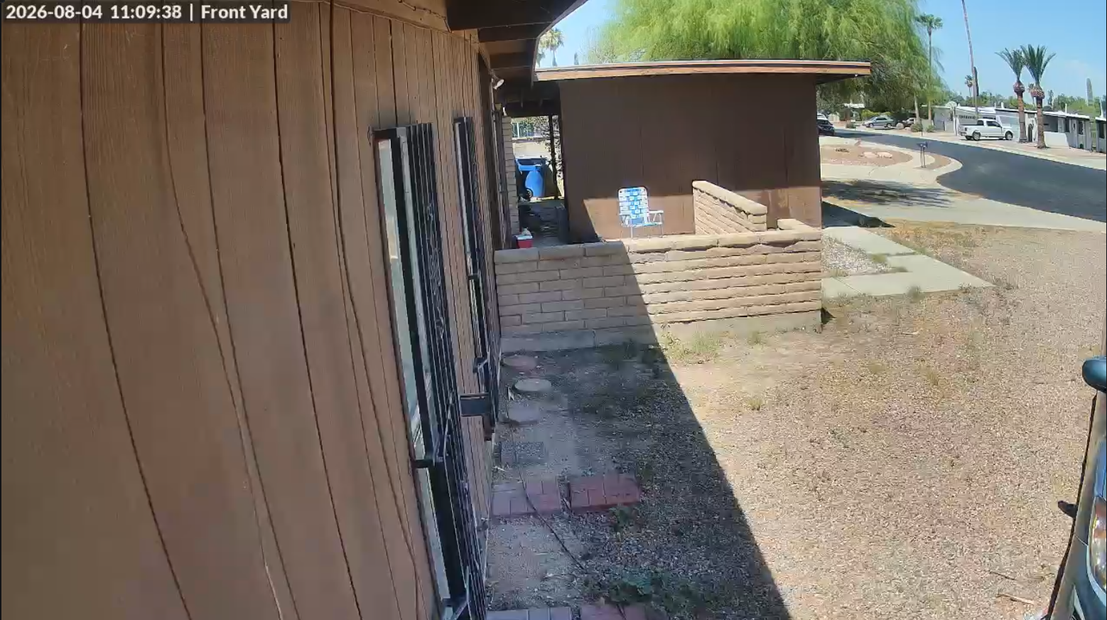 UniFi camera view of a Tucson front yard