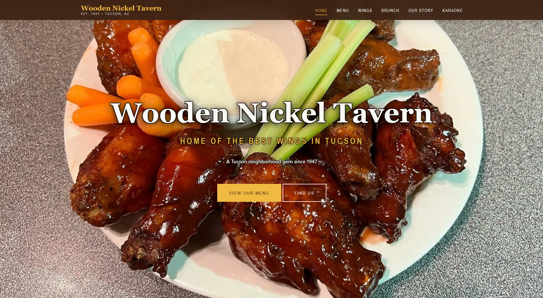 Wooden Nickel Tavern homepage featuring its wings, navigation, menu, and location links
